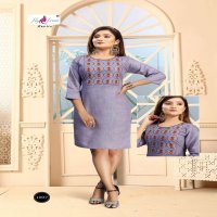 TONACT VOL.2 BY FLY FREE HEAVY RAYON TWO TONE WITH WORK KURTI CATLOG WHOLESALER BEST RATE