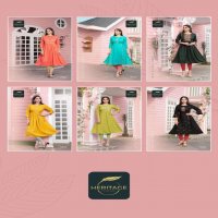 SAYESHA VOL-2 BY HERITAGE HEAVY RAYON TWO-TONE DESIGNER EMBROIDERED KURTI WITH GHERA & HANDWORK KURTI CATALOG