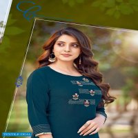 Wooglee Celebration Vol-15 Wholesale Heavy Reyon Kurti With Pants